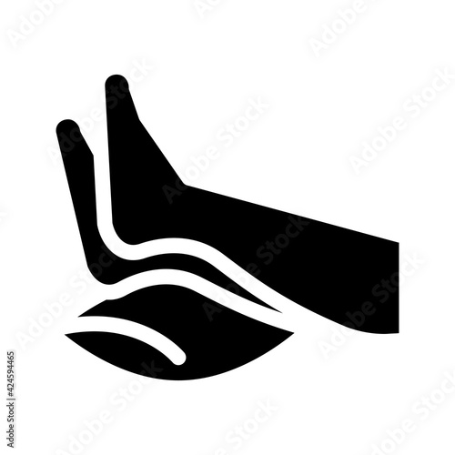 legs resting on pillow glyph icon vector. legs resting on pillow sign. isolated symbol illustration