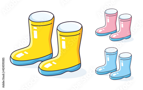 Yellow, pink and blue wellies gum boots isolated