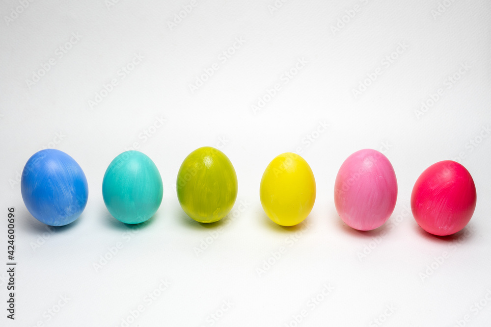 Six colorful eggs on white background. Standing up. Creative Easter background Six colorful eggs on white background. Standing up. Creative Easter background