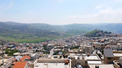 Majdal Shams, Pan shot of the Druze village houses on the slopes of Hermon mountain, Northern Israel. photo