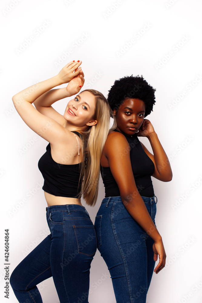 Fototapeta premium teenage friends cheerful having fun, happy smiling, cute posing isolated on white background, lifestyle people concept, african-american and caucasian