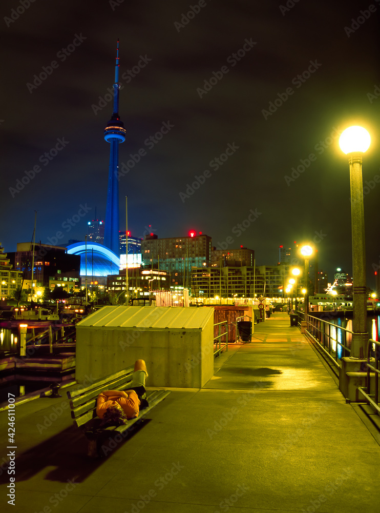Me laying on the bench in Toronto one summer night.