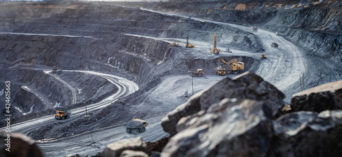 Work of heavy equipment in an open pit