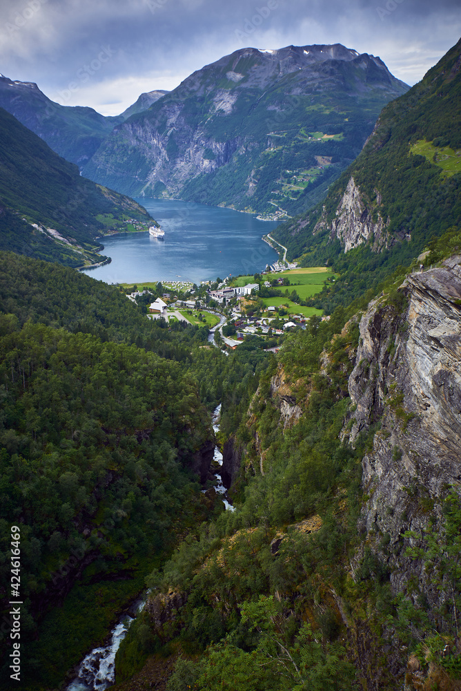 Geiranger Fjord view with a ferry at the background