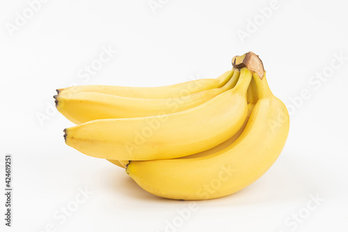a bunch of ripe fruit bananas isolated on white background