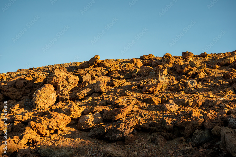 Obraz premium Rock formations on the Haleakala crater at sunset.