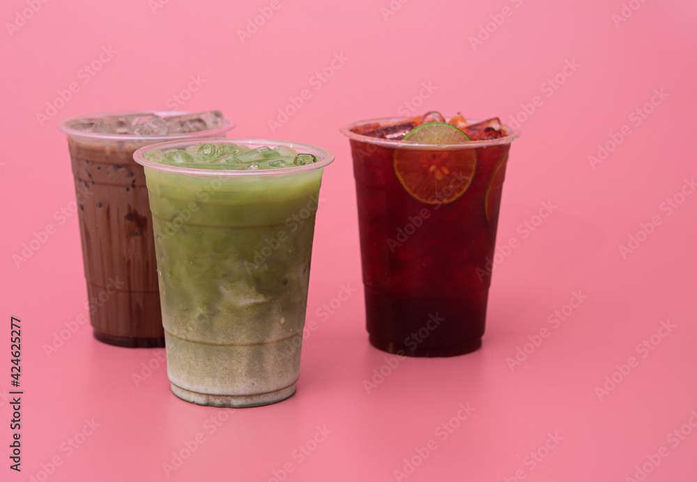 Iced green tea,iced cocoa and iced lemon tea on pink background Iced green tea,iced cocoa and iced lemon tea on pink background
