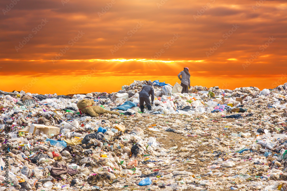 Garbage Dump Pile In Trash Dump Or Landfill backhoe And Truck Is