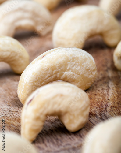 fresh raw cashew nuts on the kitchen table