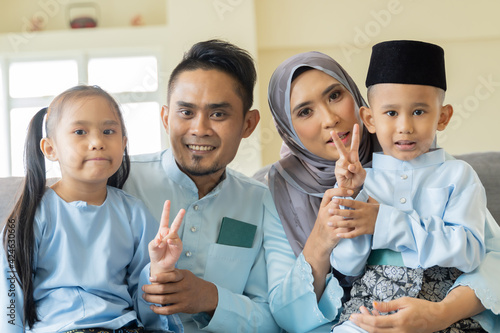 Eid Mubarak celebration moment with Malay family photo