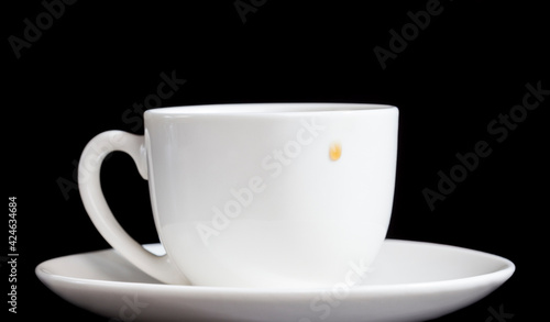 white glass cup with black delicious aromatic coffee