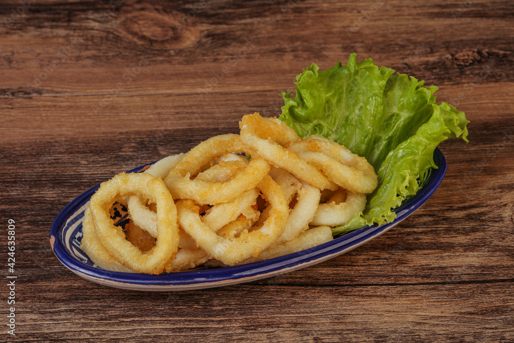 Roasted squid rings with salad Roasted squid rings with salad