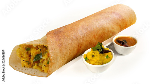 South Indian Masala Dhosa or dosa served with sambhar, coconut chutney, red chutney and green chutney, South Indian Breakfast