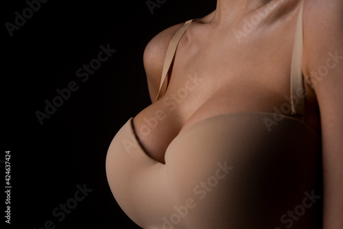 Sexy breasts. Woman breas  boobs in bra  sensual tits. Beautiful slim female body. Lingerie model. Closeup of sexy female boob in bra.