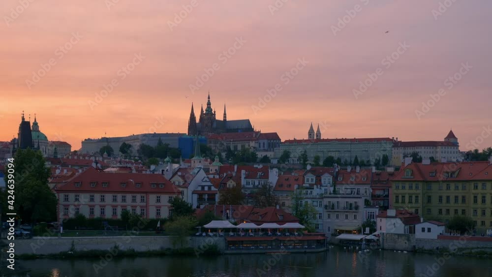 Prague town, Vltava river and Vitus Cathedral at late evening in Prague, Czech Republic Prague town, Vltava river and Vitus Cathedral at late evening in Prague, Czech Republic
