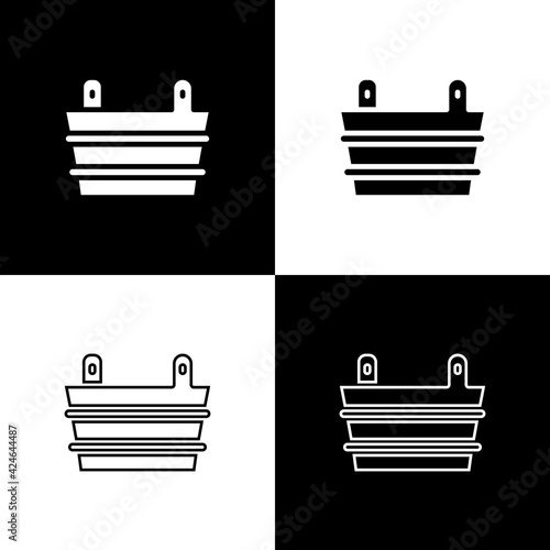 Set Sauna bucket icon isolated on black and white background. Vector