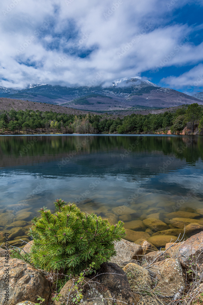 Reflection of a mountain in a lake. Mount Moncayo, Zaragoza Spain