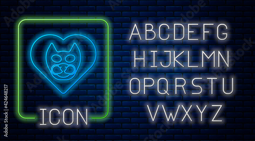 Glowing neon Heart with cat icon isolated on brick wall background. Love to the animals. Neon light alphabet. Vector