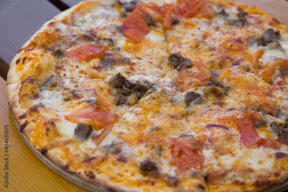 A delicious hot Italian pizza A delicious hot Italian pizza