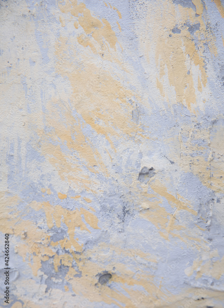 Old yellow gray surface. Cement wall with coarse texture. Decorative vintage background.