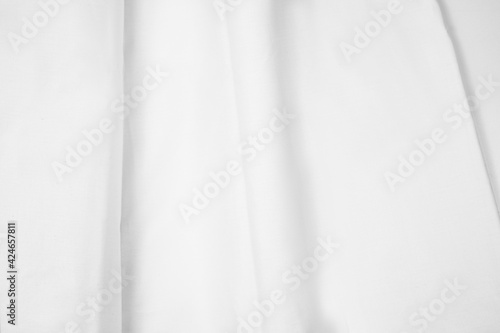 wavy folded white fabrics. well designed white curtain concept. textile texture mockup for creative design preview.