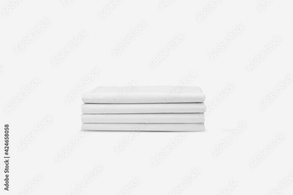 a tidy pile of folded white fabrics. well designed white fabric cloth concept. textile texture mockup for creative design preview. a tidy pile of folded white fabrics. well designed white fabric cloth concept. textile texture mockup for creative design preview.