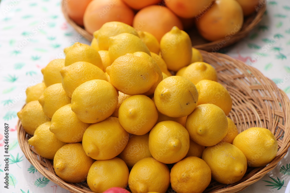 Fruit, yellow lemons in a basket
