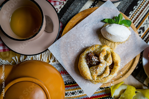 Traditional Georgian sweets and desserts with hazelnuts, walnuts, grape juice, honey, chocolate. Baklava, nakhini, churchkhela. Fresh fruits and candied fruits. Traditional Turkish coffee. photo