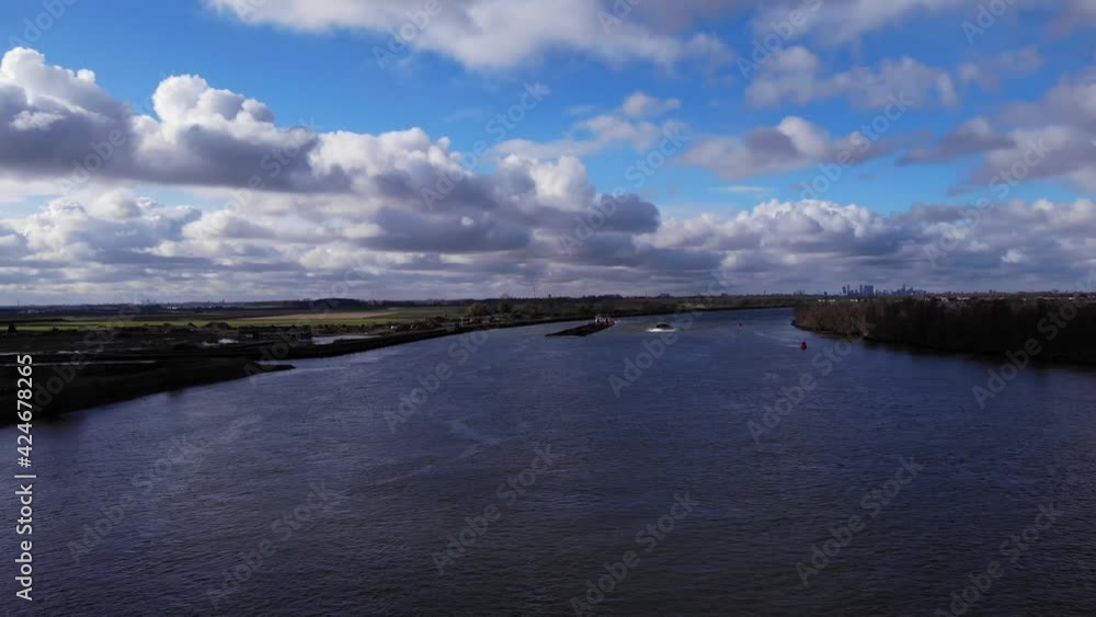Aerial View Of Oude Maas River Near Puttershoek Town In South Holland, Netherlands. Aerial View Of Oude Maas River Near Puttershoek Town In South Holland, Netherlands.
