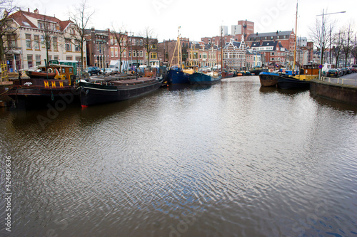 Noorderhaven (northern Harbour) in Groningen with old warehouses converted to houses along the water. © Fons