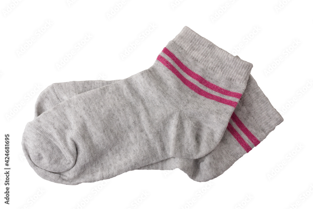 Pair of grey striped cotton socks isolated on white background. Fast fashion, mass production concept Pair of grey striped cotton socks isolated on white background. Fast fashion, mass production concept