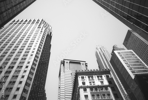 Looking up at Manhattan buildings  New York City  USA.