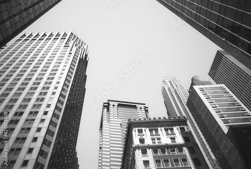 Canvas Print Looking up at Manhattan buildings, New York City, USA.