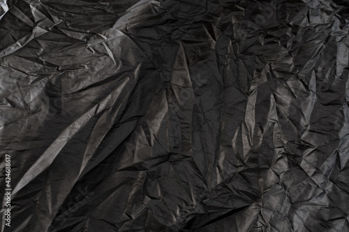 black crumpled storage cover