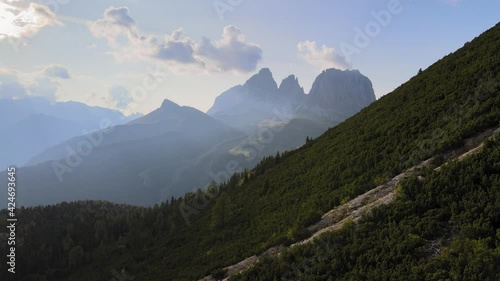 Cinematic aerial view of Dolomites, Italy. Drone goes down photo