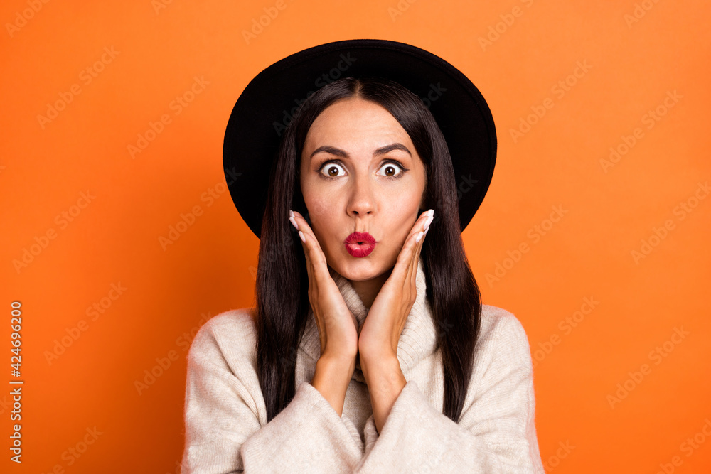 Portrait of attractive amazed woman incredible news reaction pout lips isolated over bright orange color background Portrait of attractive amazed woman incredible news reaction pout lips isolated over bright orange color background