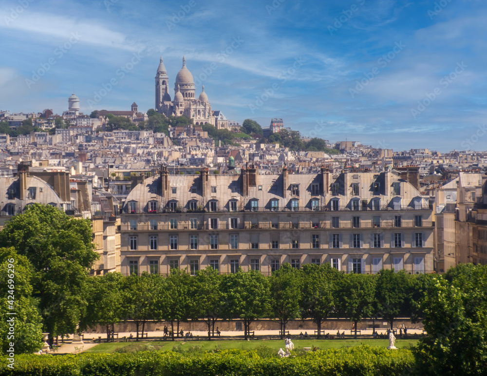 Paris skyline looking across jardin des tuileries toward sacre coeur.