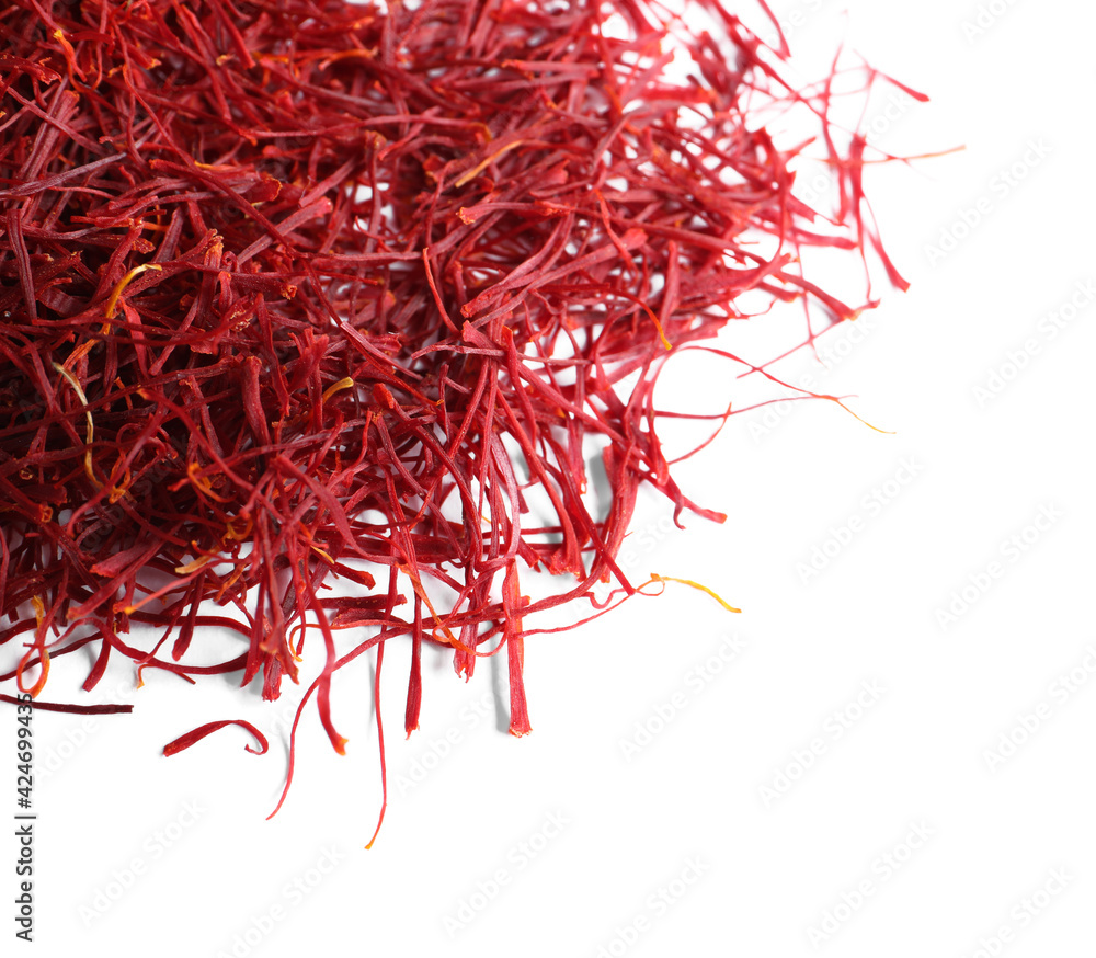 Fototapeta premium Dried saffron on white background, top view