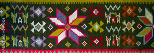 Vintage hand-woven woolen rugs.