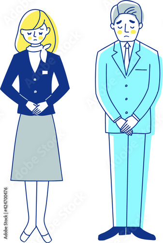 ビジネスパーソン　お詫びをする男女