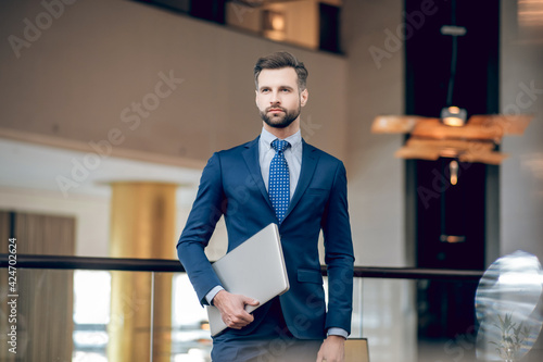 Elegant businessman in a nice suit in the office