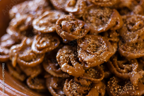 Detail shot of shiny Chebakia moroccan sweets for Ramadan.