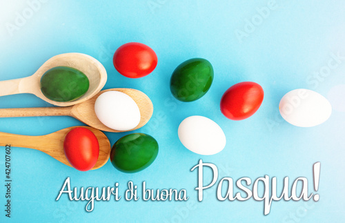 Happy Easter holiday text in italian card, Easter eggs as the color of the Italian flag - green, white, red	
