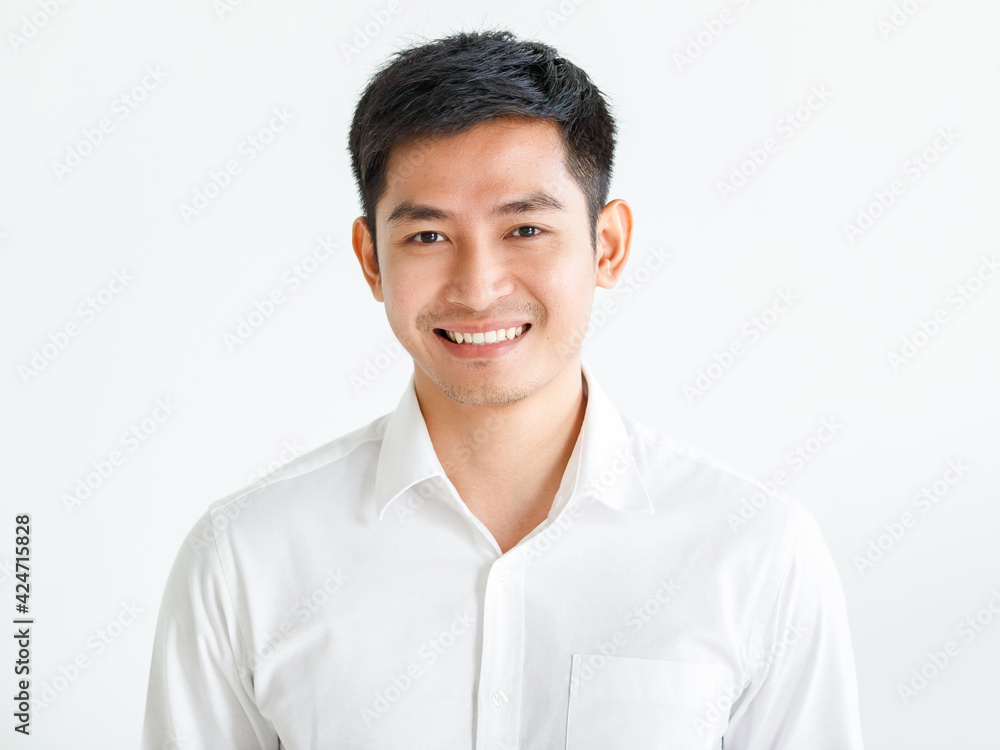 Young, handsome and friendly face man smile, dressed casually with happy and self-confident positive expression with crossed arms on white background studio shot. Concept for good attitude boy Young, handsome and friendly face man smile, dressed casually with happy and self-confident positive expression with crossed arms on white background studio shot. Concept for good attitude boy