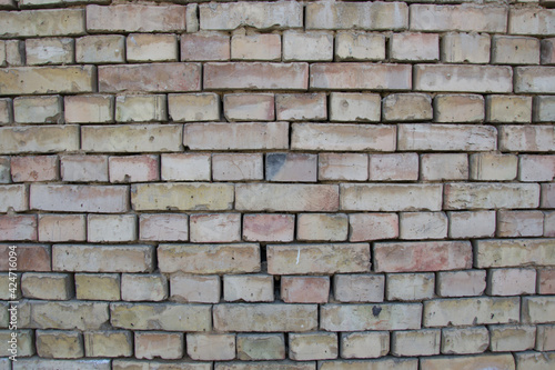 Old damaged brown bricks wall pattern, wall texture, exterior, building exterior, brickwork
