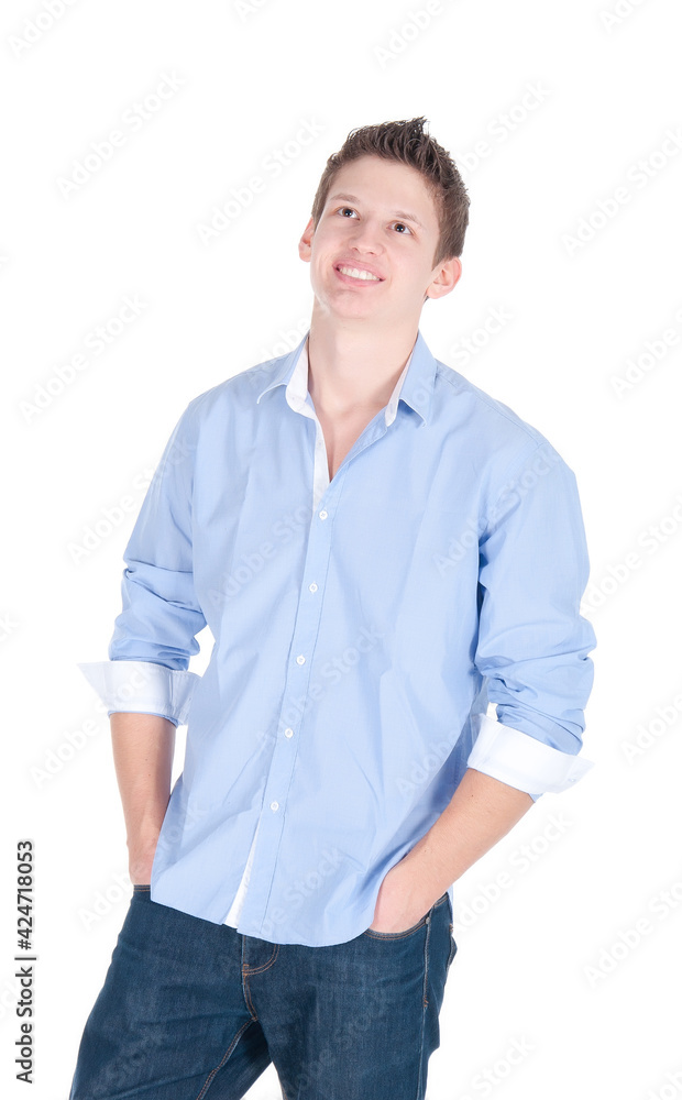 Portrait of handsome young man in casual clothes standing over white background