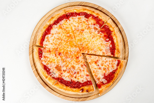 Cooked margarita pizza shot on white background