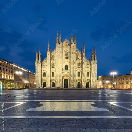 Milano Duomo Cathedral, Vittorio Emanuele II Gallery on Piazza del Duomo at night. Romantic architecture of Italy, Milan in twilight.
