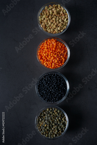 lentil assortment on black stone surface © Diana Taliun