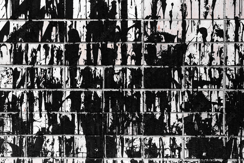 Old brick wall splashed with molten resin used for background Old brick wall splashed with molten resin used for background